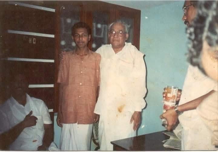 A young Saleem Madavoor with a senior leader