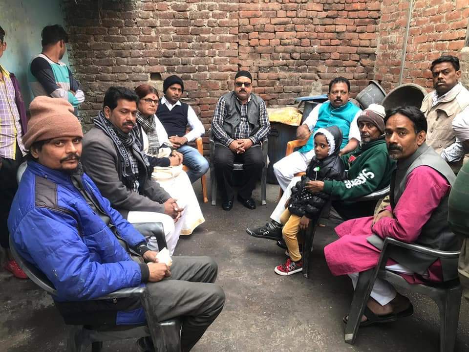 Saleem Madavoor with a bereaved family in Firozabad