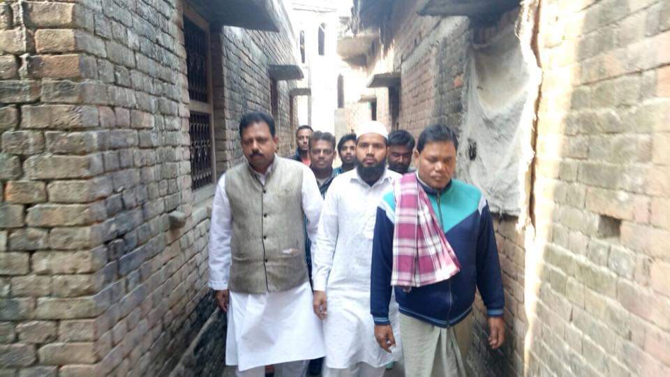 Saleem Madavoor walking through a village